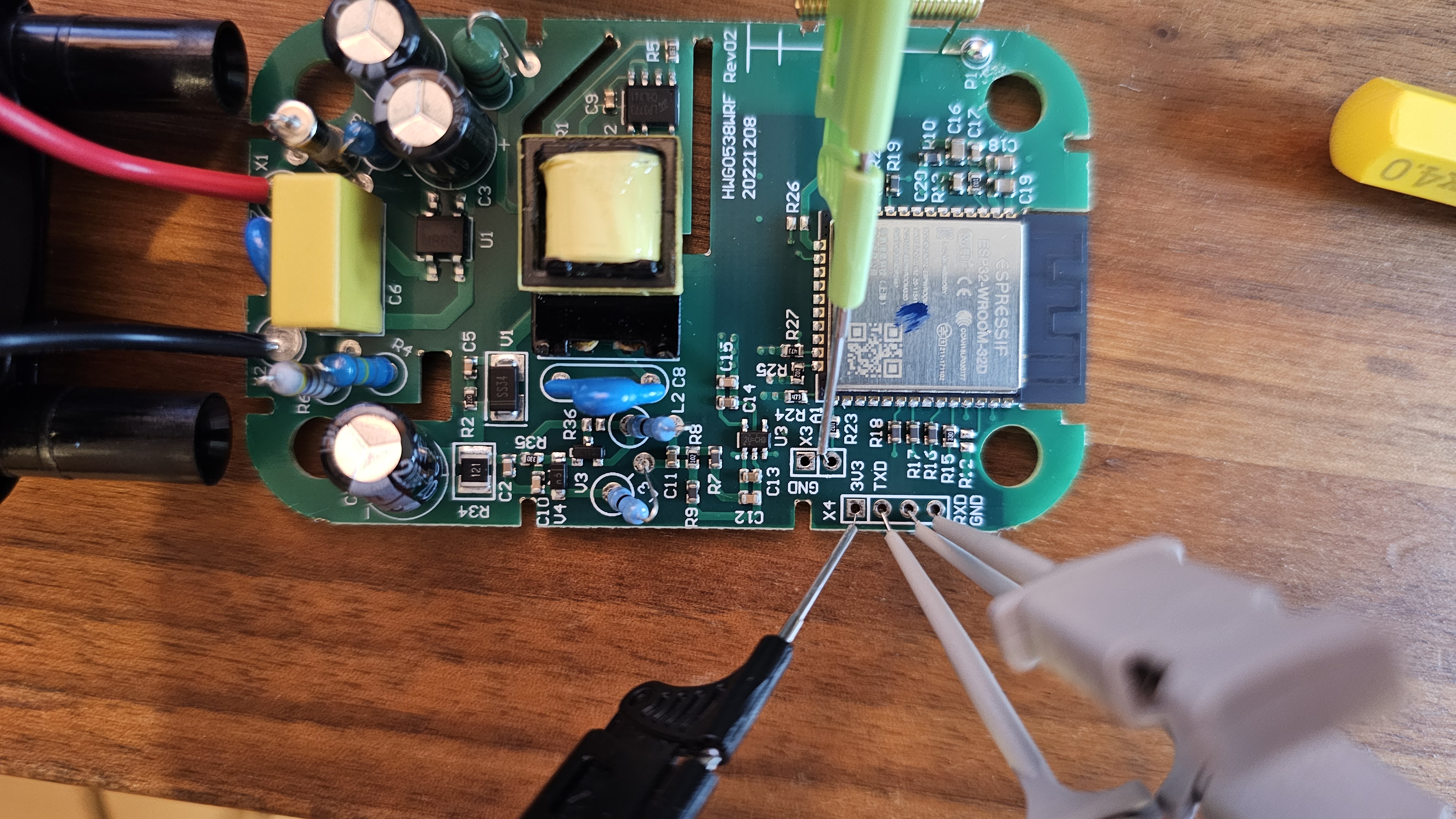Opened DIIVOO gateway PCB showing the mains input side and internal power supply components.